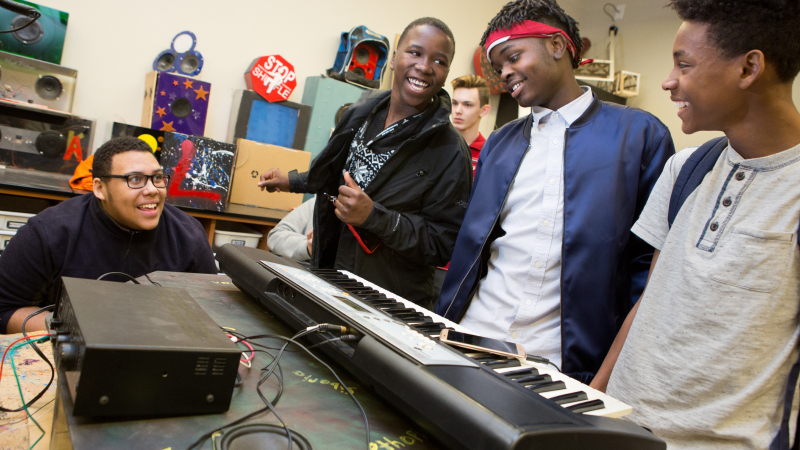 Students with musical equipment
